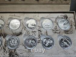Ensemble complet de 10 pièces d'argent fin de 15 dollars RCM 2014 explorant le Canada de la Monnaie royale canadienne