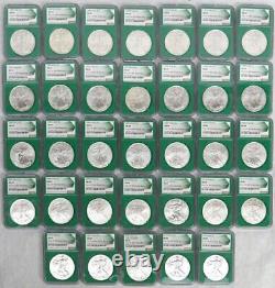 Ensemble complet de pièces d'argent américaines Eagles 1986-2018 en NGC MS69 dans des étuis scellés par la Monnaie